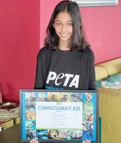 Anya Kunder, daughter of Farah Khan, receives the award from PETA India for her efforts to save homeless animals during COVID-19.