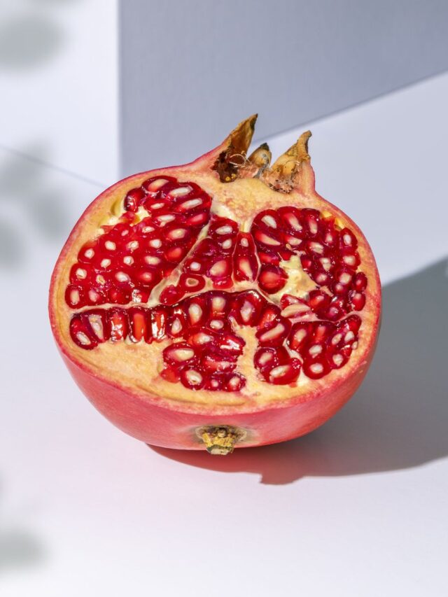 pomegranate-slice-on-white-background-royalty-free-image-1703162468